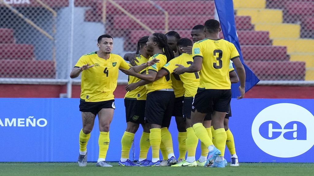 Jamaica's Michail Antonio celebrates with his teammates after scoring his side's first goal against Panama during a qualifying soccer match for the FIFA World Cup Qatar 2022 at Rommel Fernandez stadium in Panama City, Panama, Sunday, Jan. 30, 2022. (AP Photo/Arnulfo Franco)
